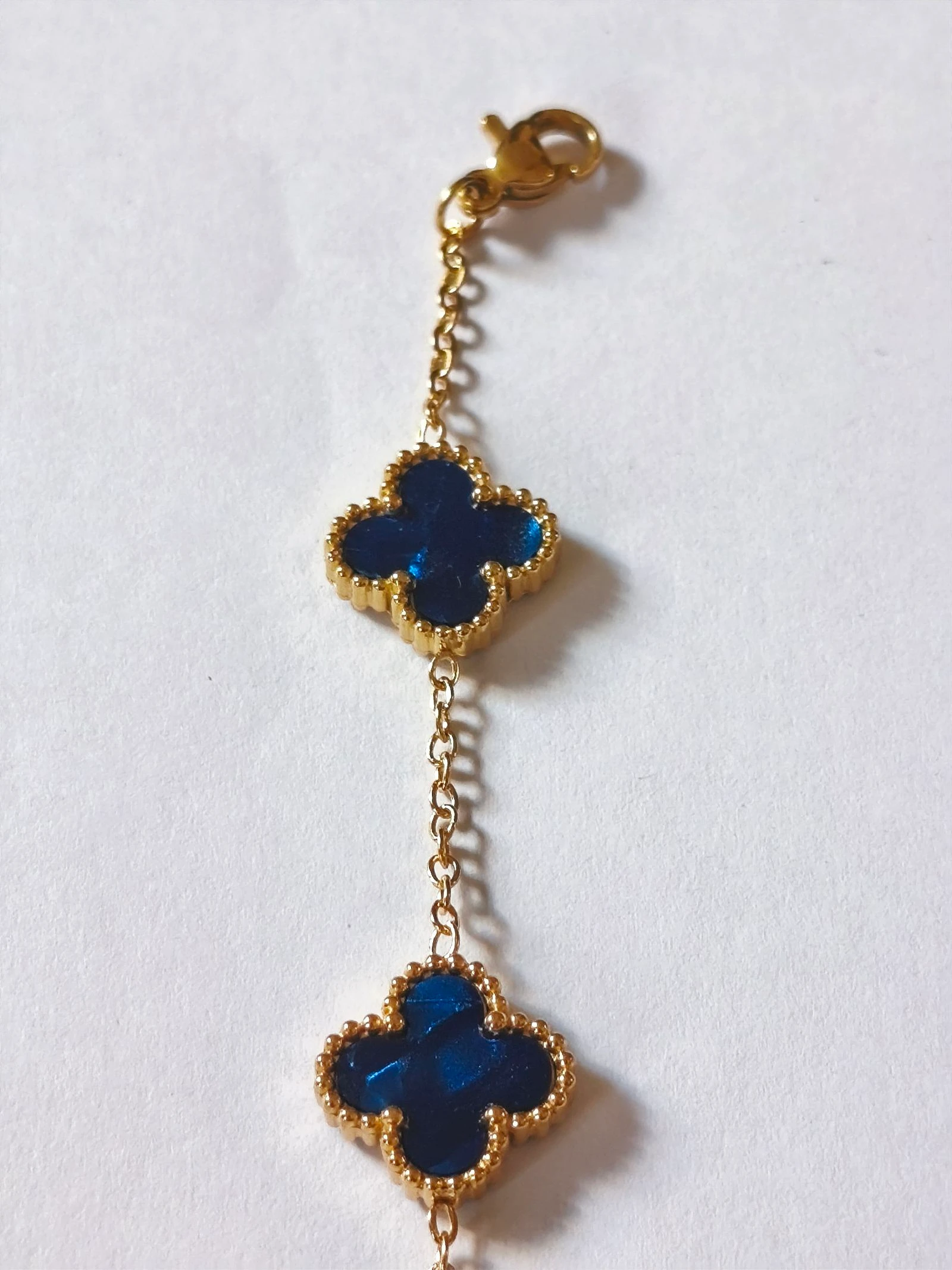 Set met ketting, armband en oorbellen van trebol blauw verlicht met onveranderlijke gouden ketting – photo 6